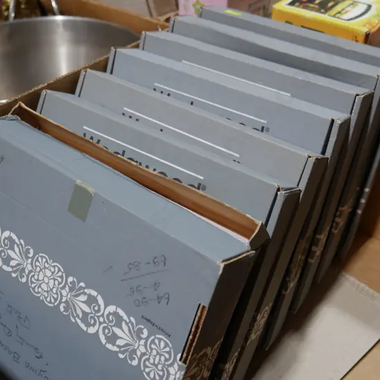 7 Wedgewood picture plates