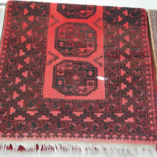 Red , black rug