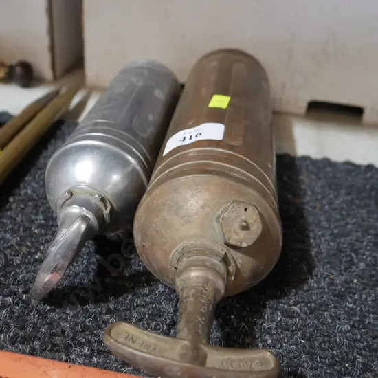 2 old extinguishers