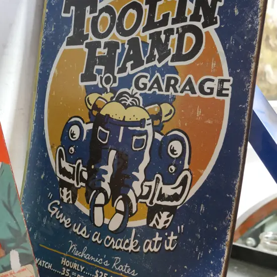 Toolin hand garage repo sign