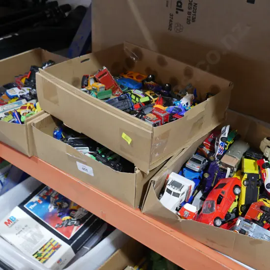 4 boxes toy cars
