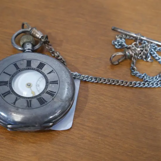 Silver pocket watch and chain