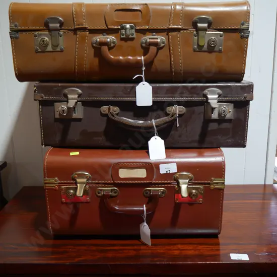 Three vintage suitcases