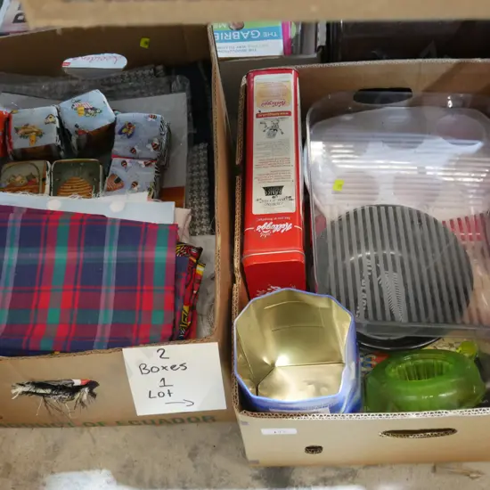 Two boxes of fabric and tins etc