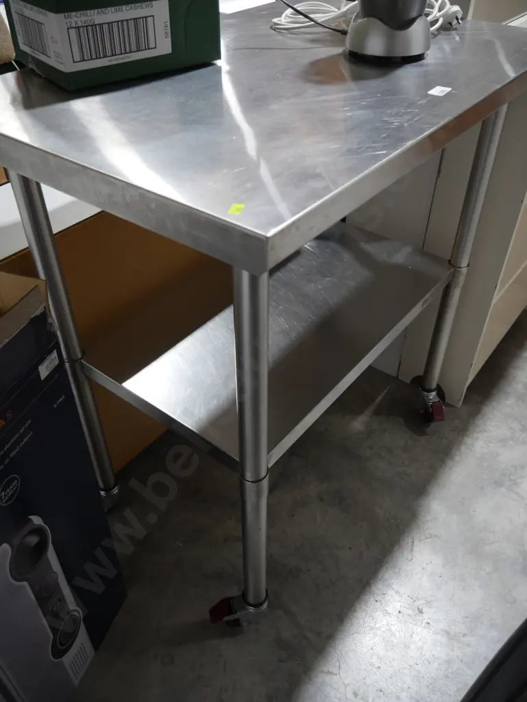 Stainless steel work bench on wheels Image 1++