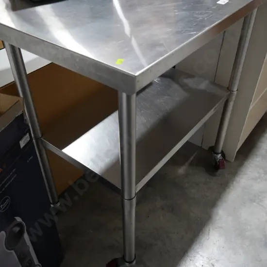 Stainless steel work bench on wheels