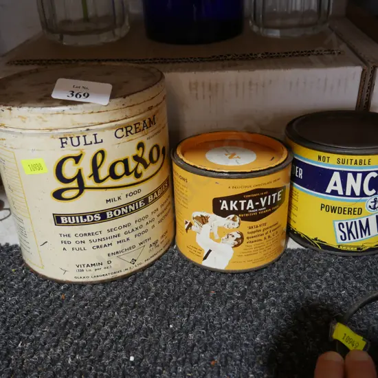 3 vintage milk powder tins