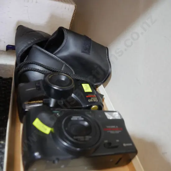 Yashica and Olympus cameras