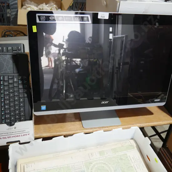 ACER computer monitor and two keyboards