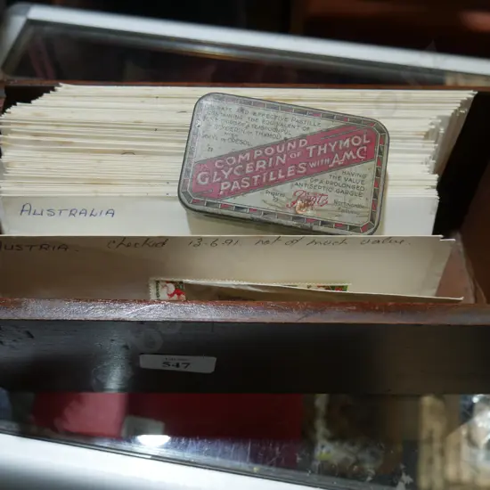 Loose stamps in envelopes and cigarette cards