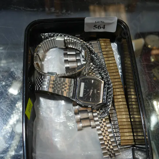 Casio wristwatch and extra watch straps