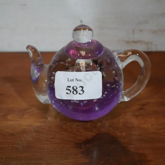 Glass teapot paperweight