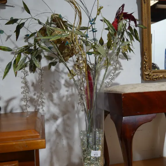 Glass vase and artificial flowers