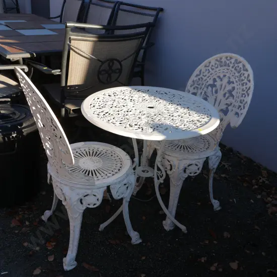 Wrought iron table and 2 chairs