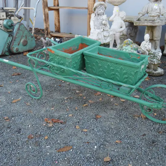 Wheel barrow and plant pots