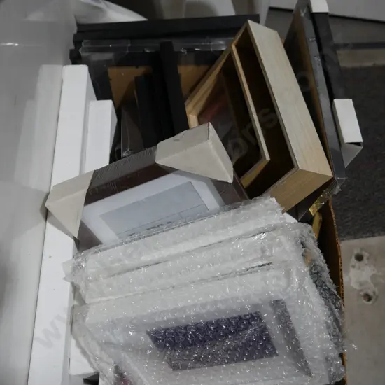 Box of picture frames, canvases