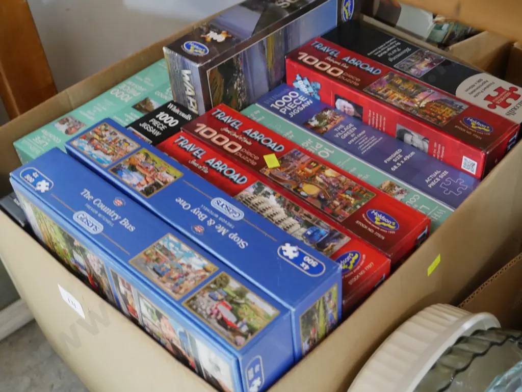 Box of jigsaws Image 1++