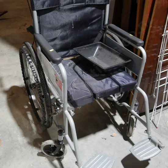 Wheelchair with drip tray