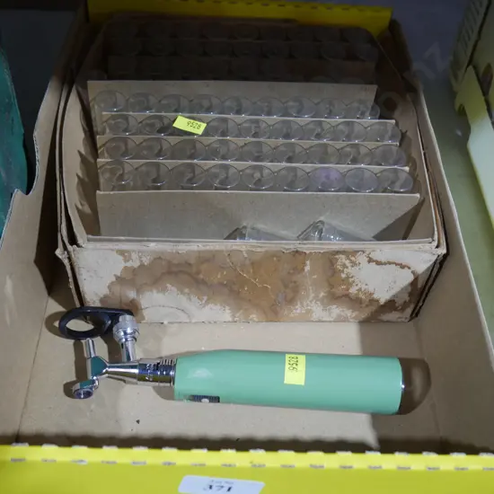 Otoscope , specimen jars