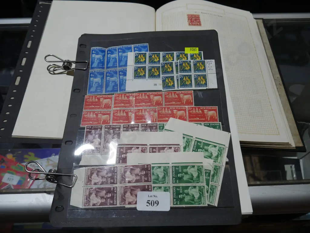 Stamp album and loose stamp pages Image 1++