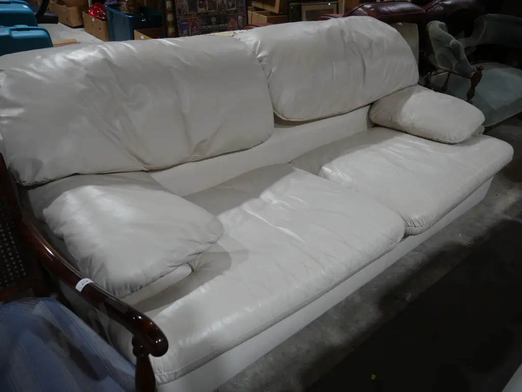 Cream leather couch and stool Image 1++