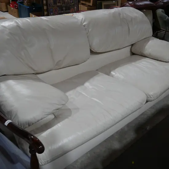 Cream leather couch and stool