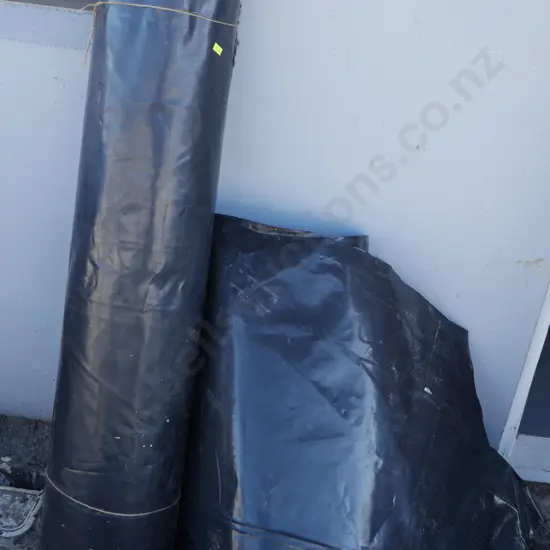 Rolls of black plastic