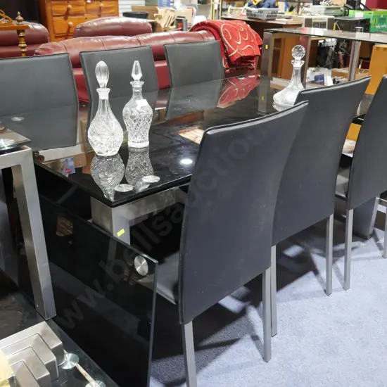 Black glass topped table and 6 chairs