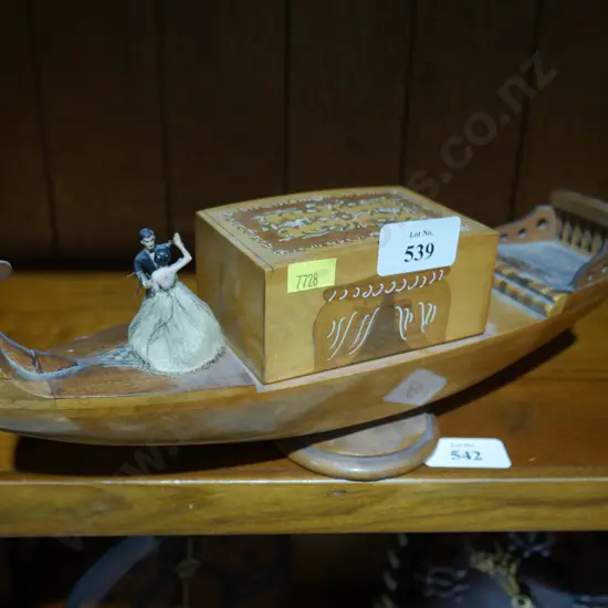 Musical boat cigarette holder