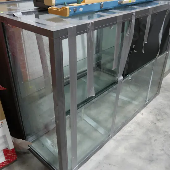 2 metal and glass display cabinets