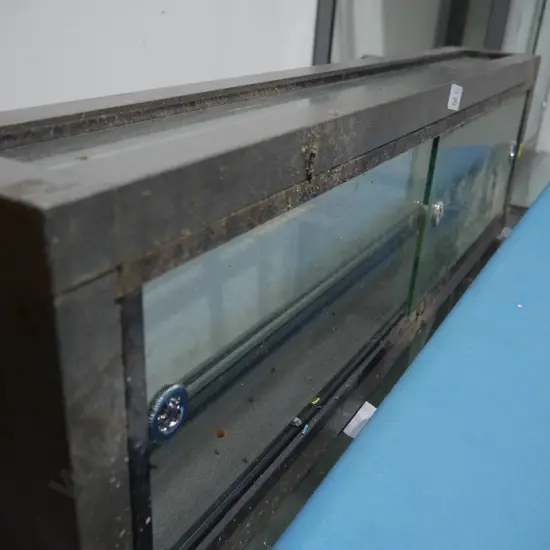 Small glass and metal display cabinet