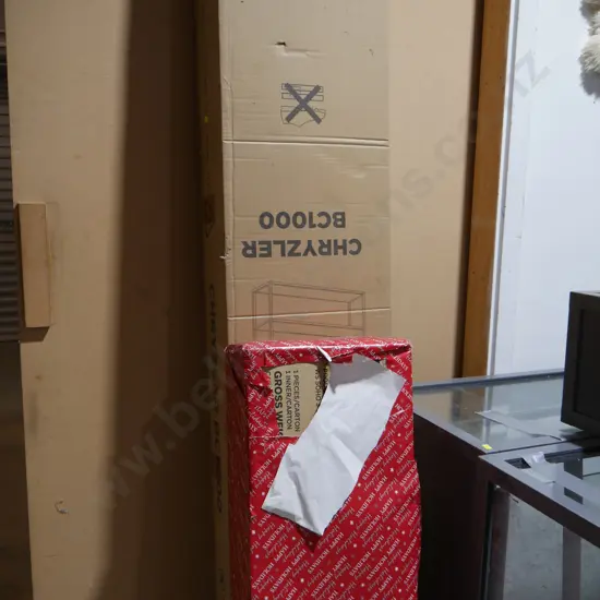 Boxed Chrysler metal display bookcase