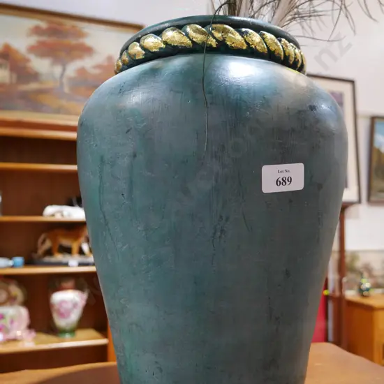 Peacock feathers in vase