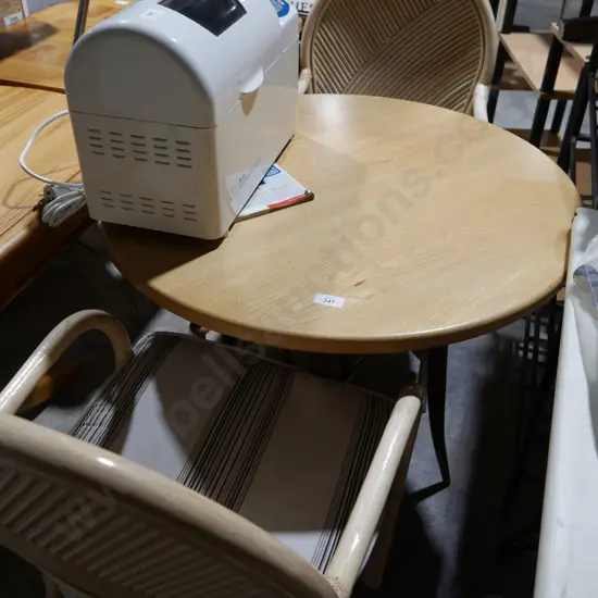 Table and 2 cane chairs