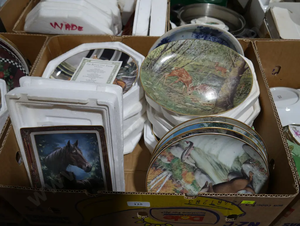 Two boxes of assorted picture plates Image 1++