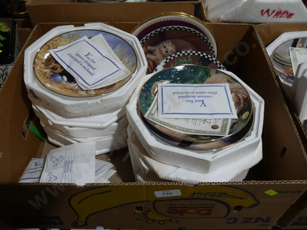Two boxes of assorted picture plates Image 1++