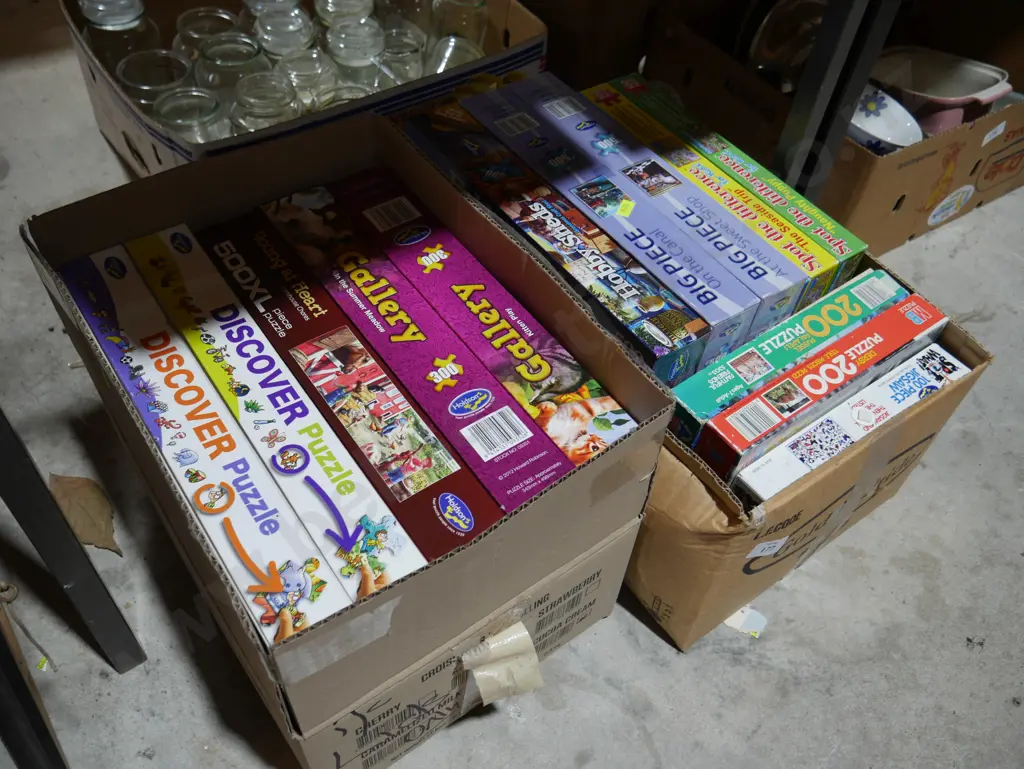 Two boxes of jigsaw puzzles Image 1++