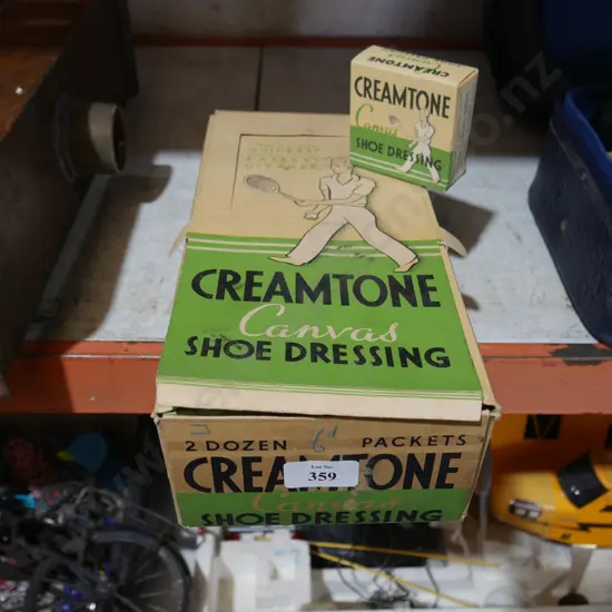 Box of creamtone canvas shoe dressing