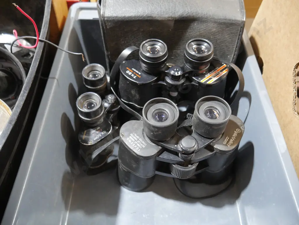 Three pair of binoculars Image 1++