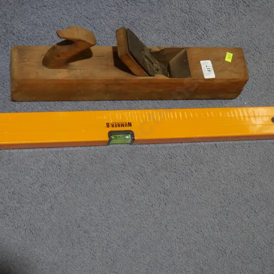 Level and wood plane