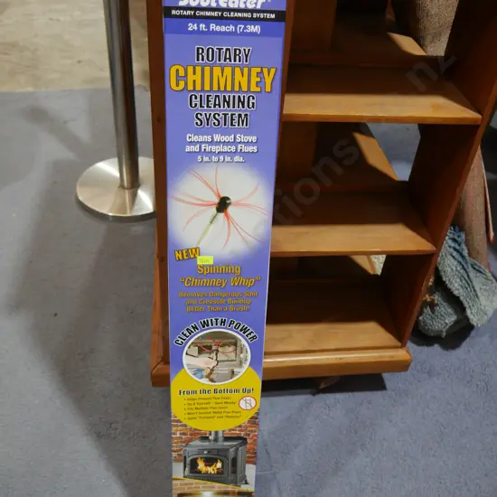 Rotary chimney cleaning system