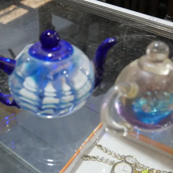 2 glass teapot paper weights