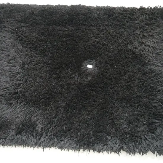 Black shaggy floor mat