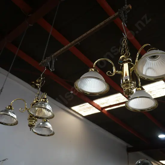 2 brass chandeliers