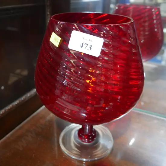 Large red glass goblet vase