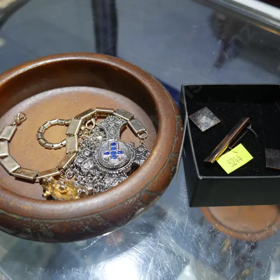 Costume jewellery in wooden trinket box