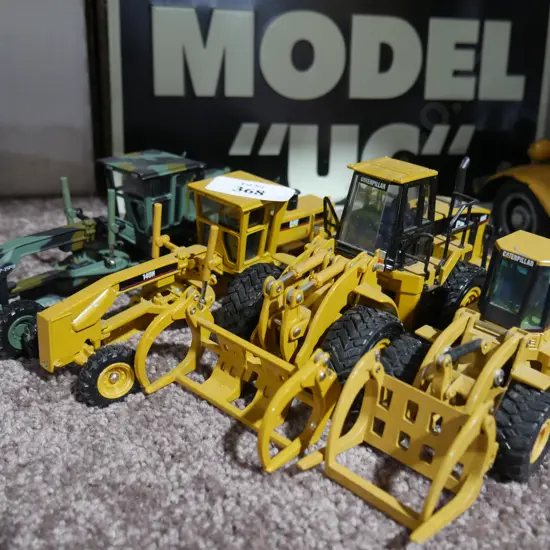 Die cast graders and loaders