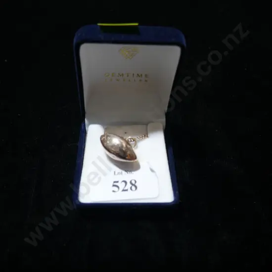 Gold rugby ball pendant