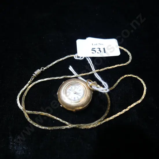 Gold watch pendant