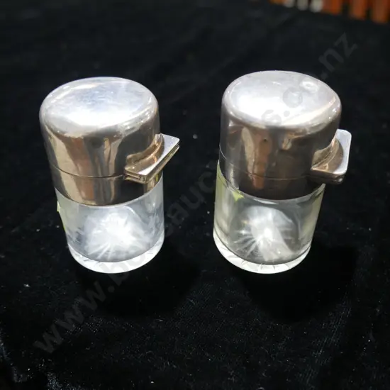 Pair silver top perfume bottles